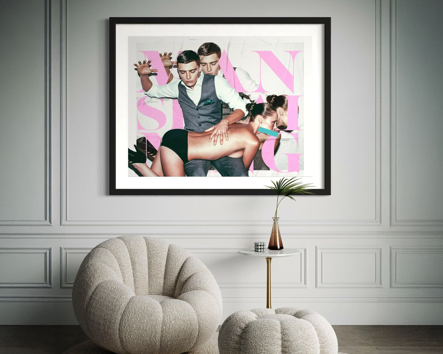 Framed artwork of a couple on a wall with decorative elements.