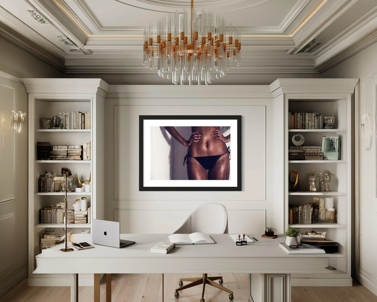 Modern office with a desk, bookshelves, and a framed picture on the wall.