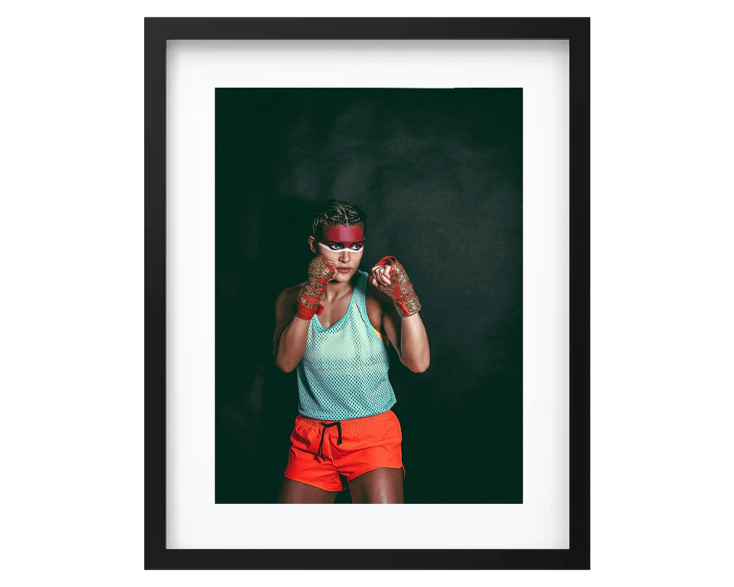 Framed artwork of a woman in athletic wear with a dark background