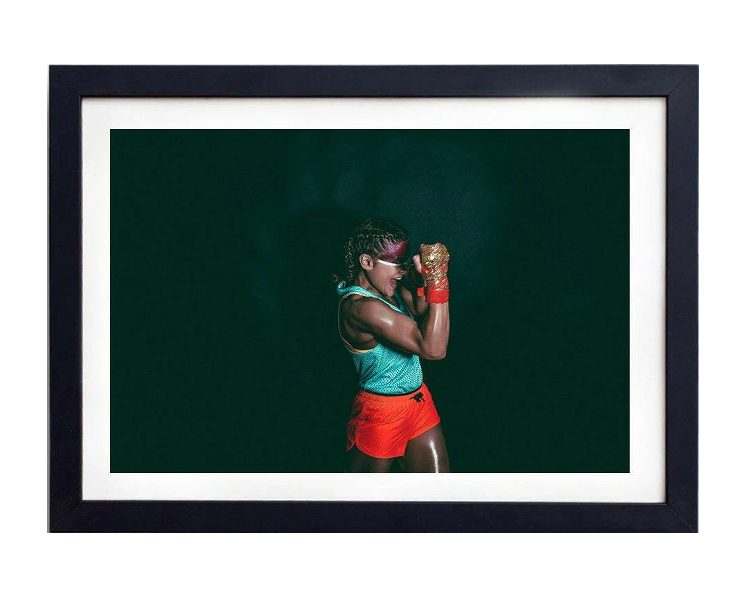 Framed artwork of a boxer in a green tank top and red shorts with a dark background.
